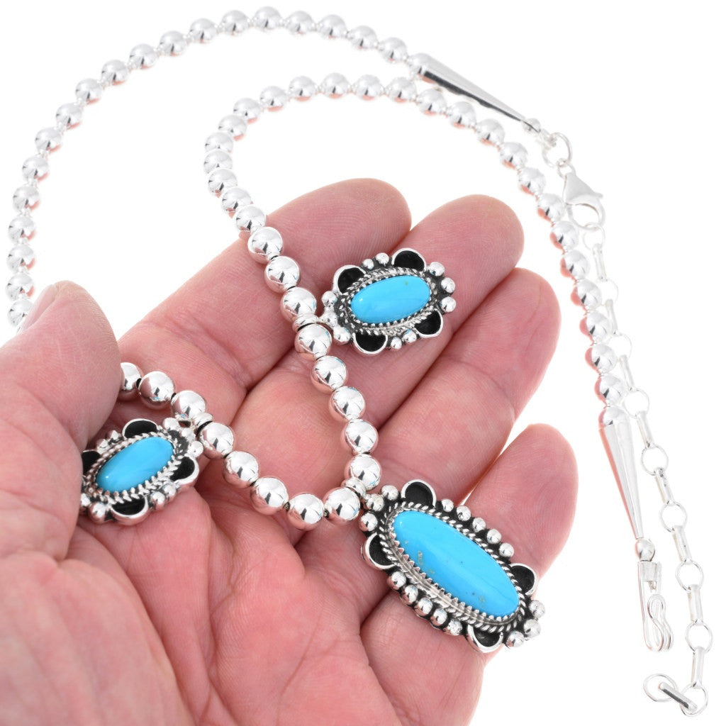 Turquoise and silver pendant necklace and earring set