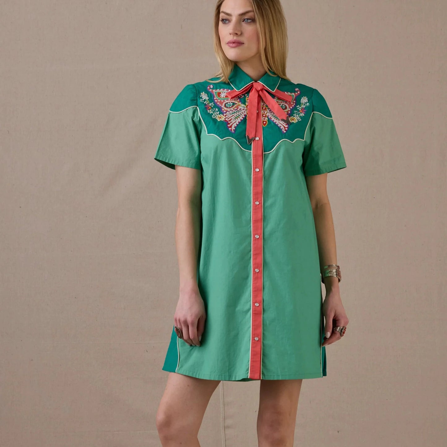 Green Just Wing It dress with embroidered detail