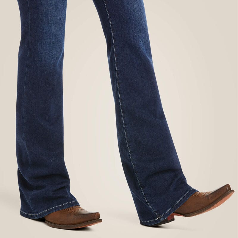 Jeans and cowboy boots.