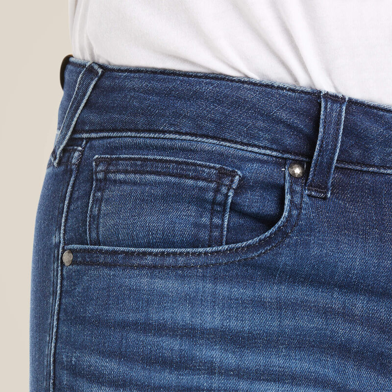 Close-up of blue denim jeans with pocket.