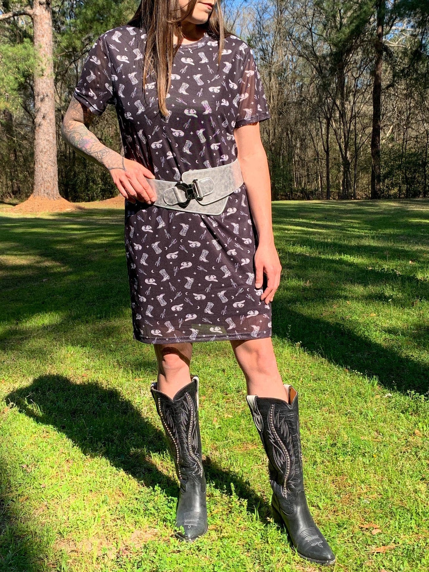 Woman in dress and cowboy boots