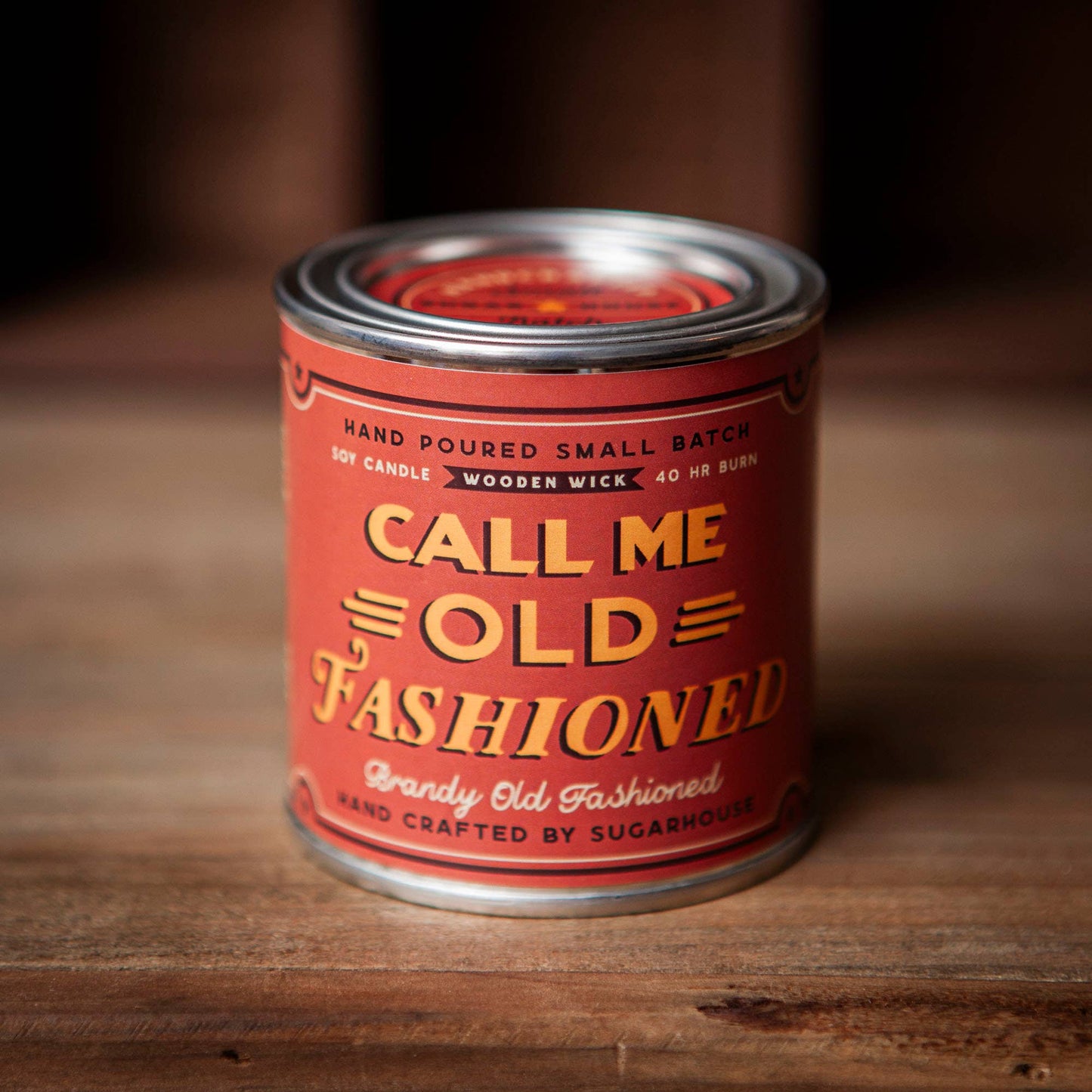 Red Call Me Old Fashioned candle in a can.