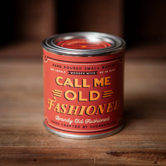 Red Call Me Old Fashioned candle in a can.