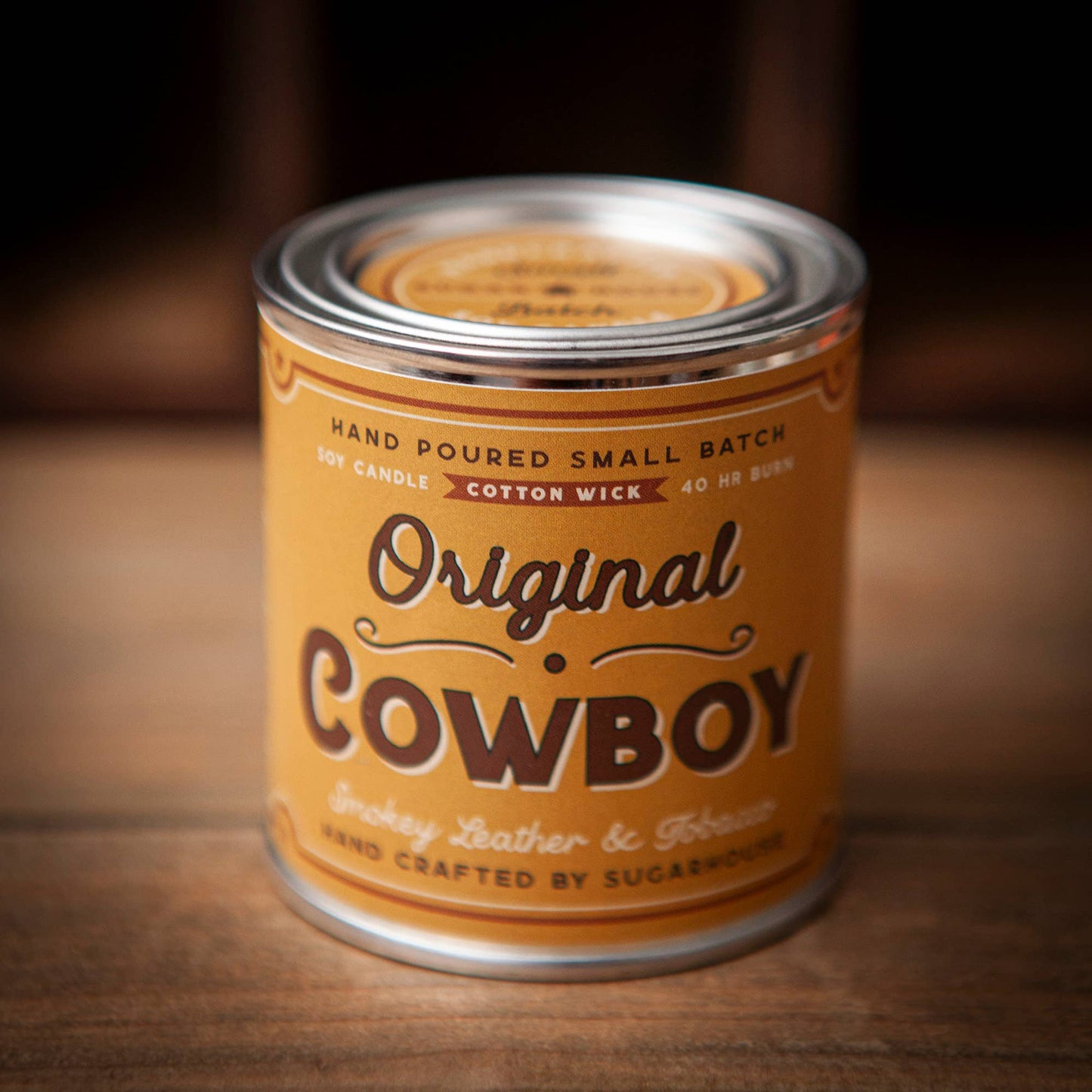 Candle in a metal tin with Original Cowboy label.