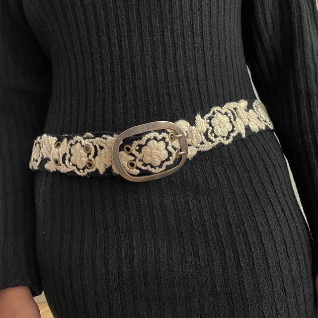 Black dress with floral embroidered belt