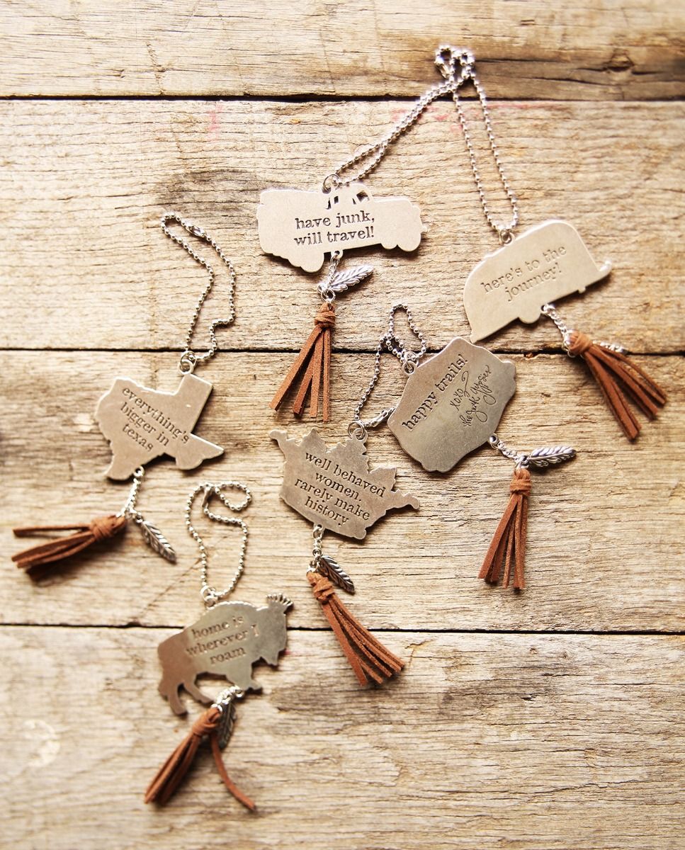 Texas and Travel themed trinkets with tassels.
