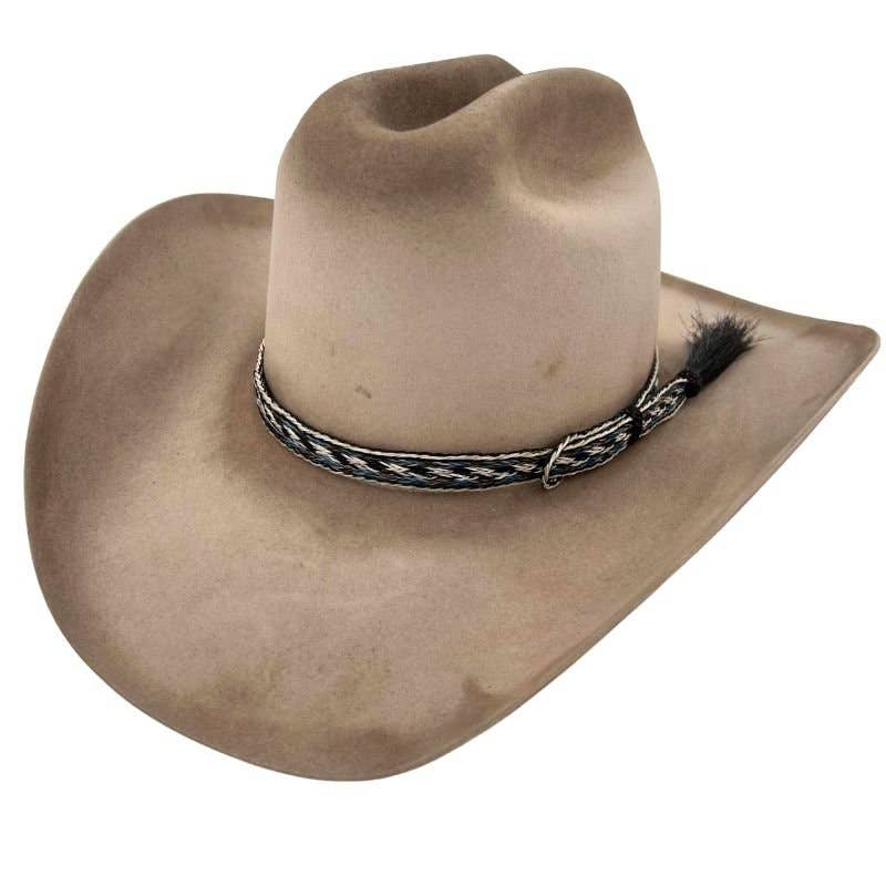 Tan cowboy hat with decorative band.