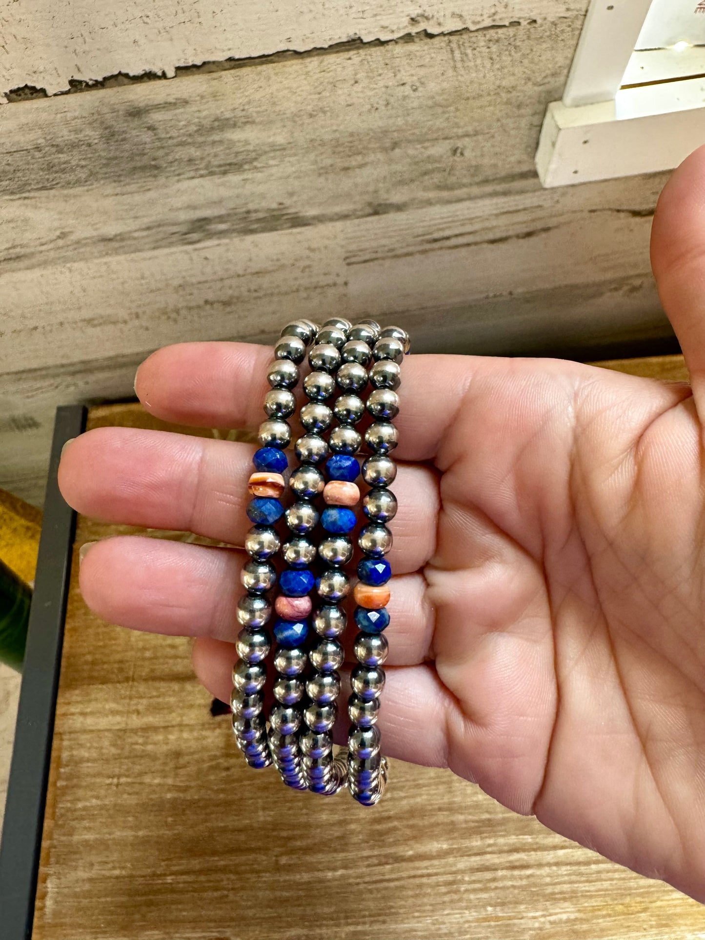 Silver beaded bracelet with blue & coral accents - 29501AE5