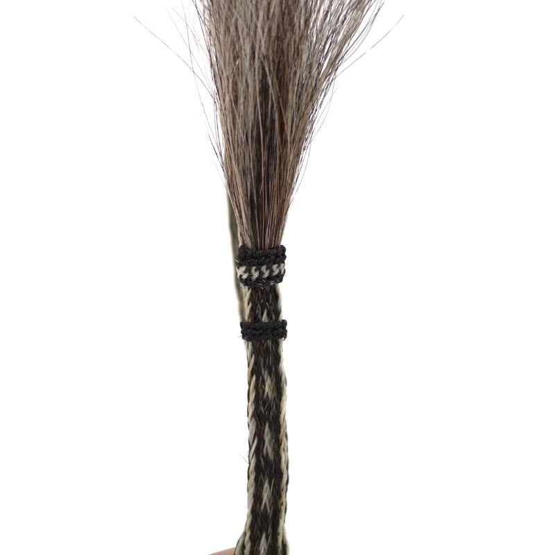 Bundle of horse hair with black bands.