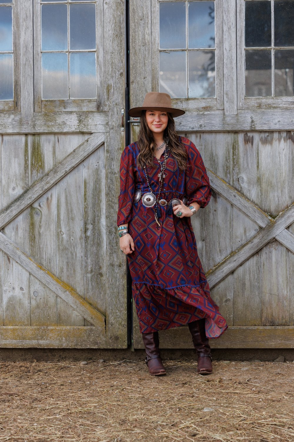 Amherst Dress woman in front of barn