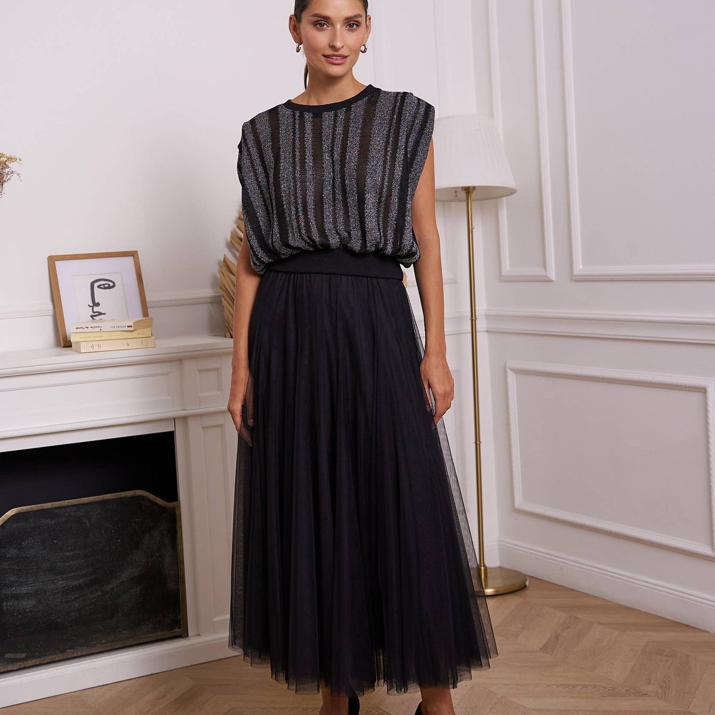 Woman in black dress.