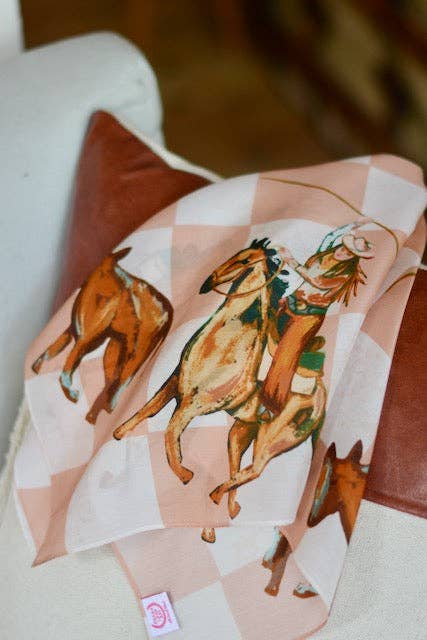 Cowboy scarf on a chair.