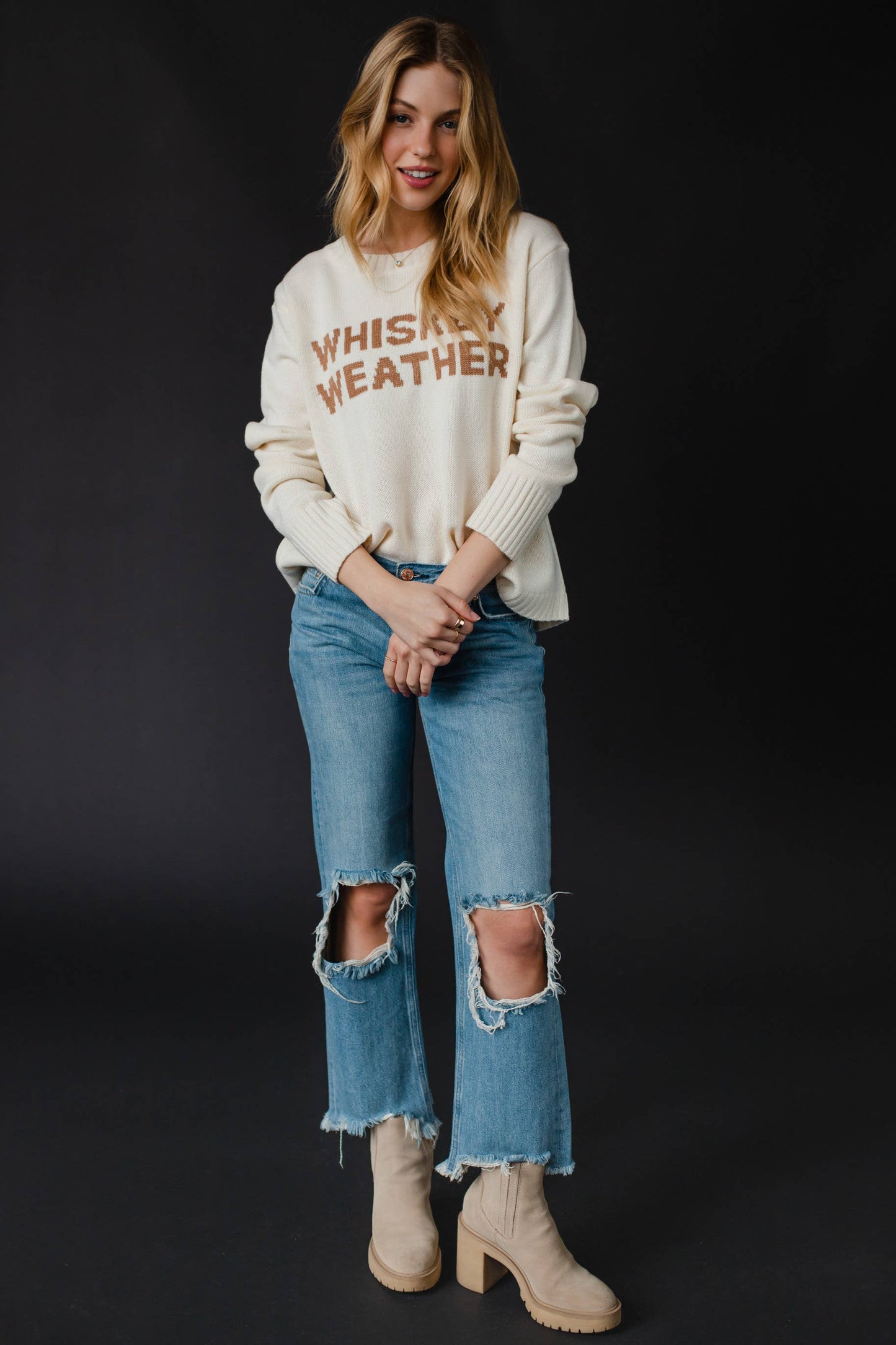 Woman in jeans and sweater