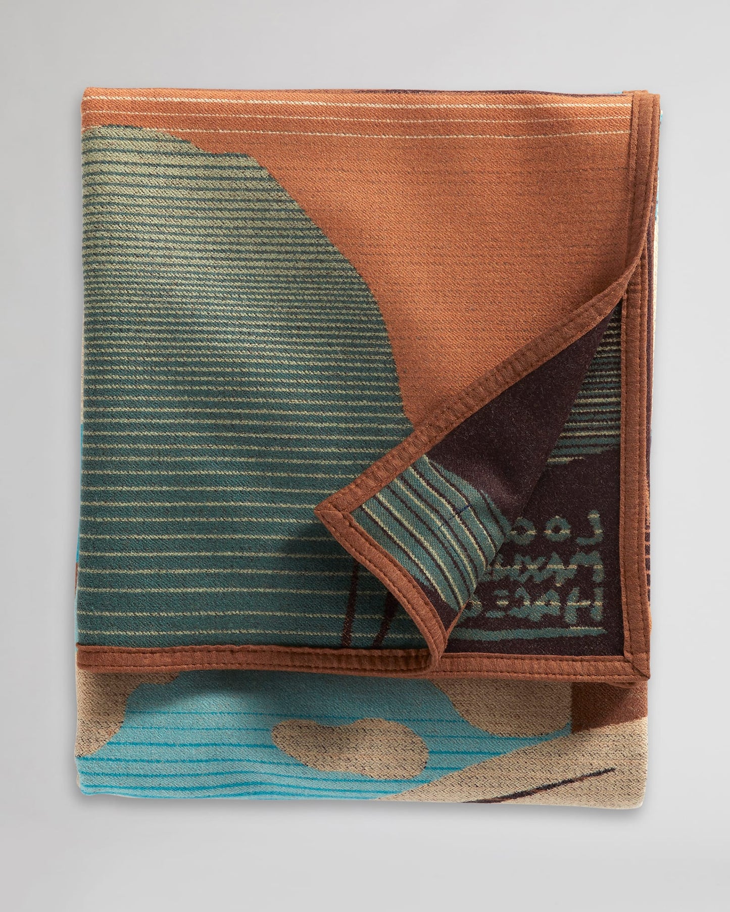 Folded blanket with landscape design