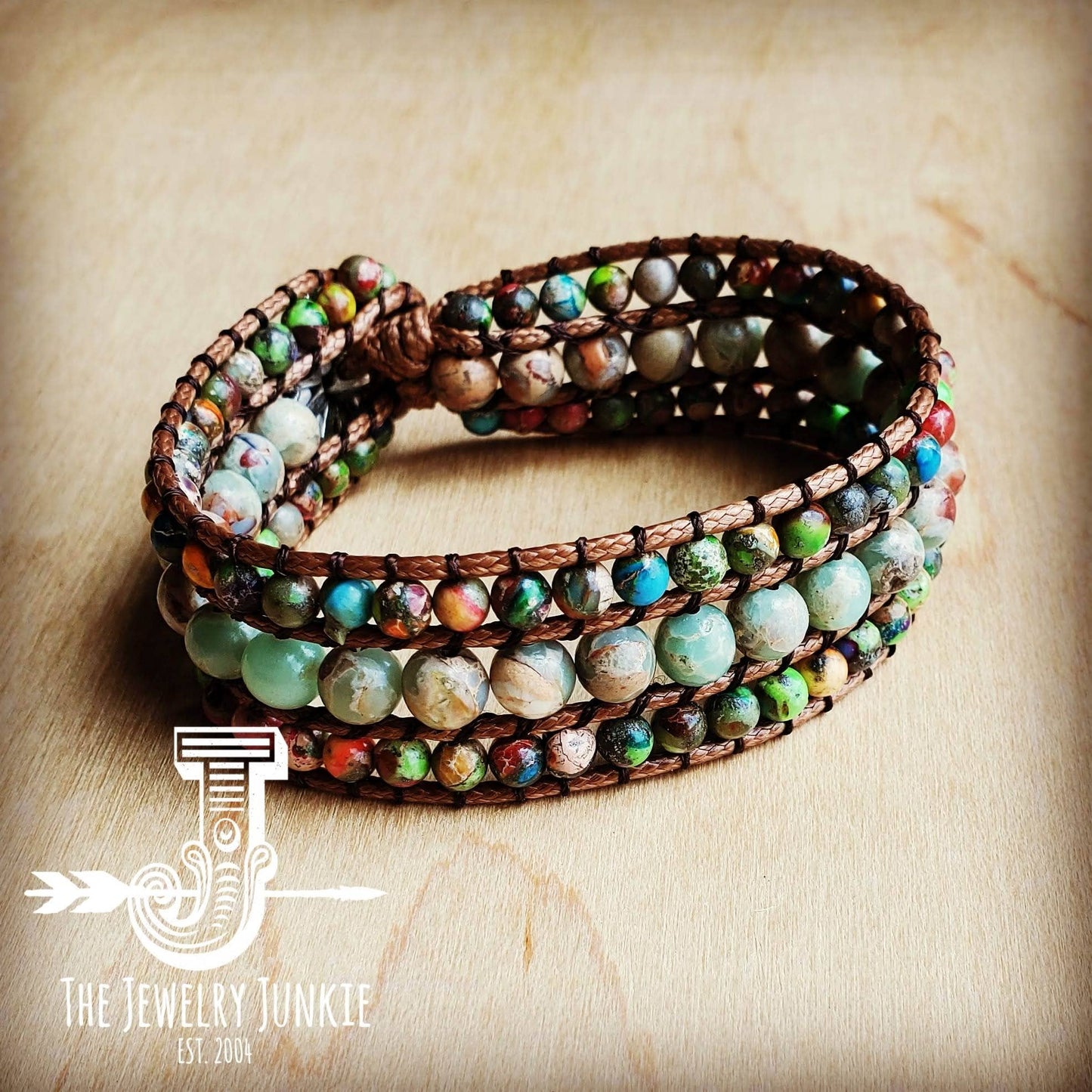 Beaded wrap bracelet on wood.