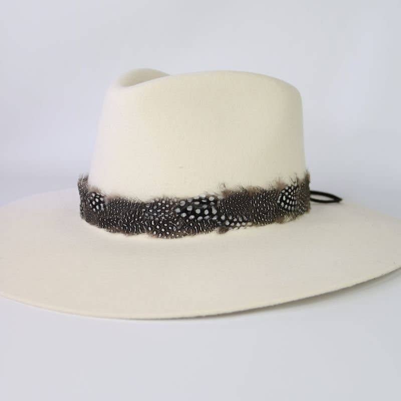 White fedora hat with feather band.