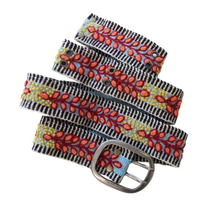 Embroidered belt with floral design and silver buckle.