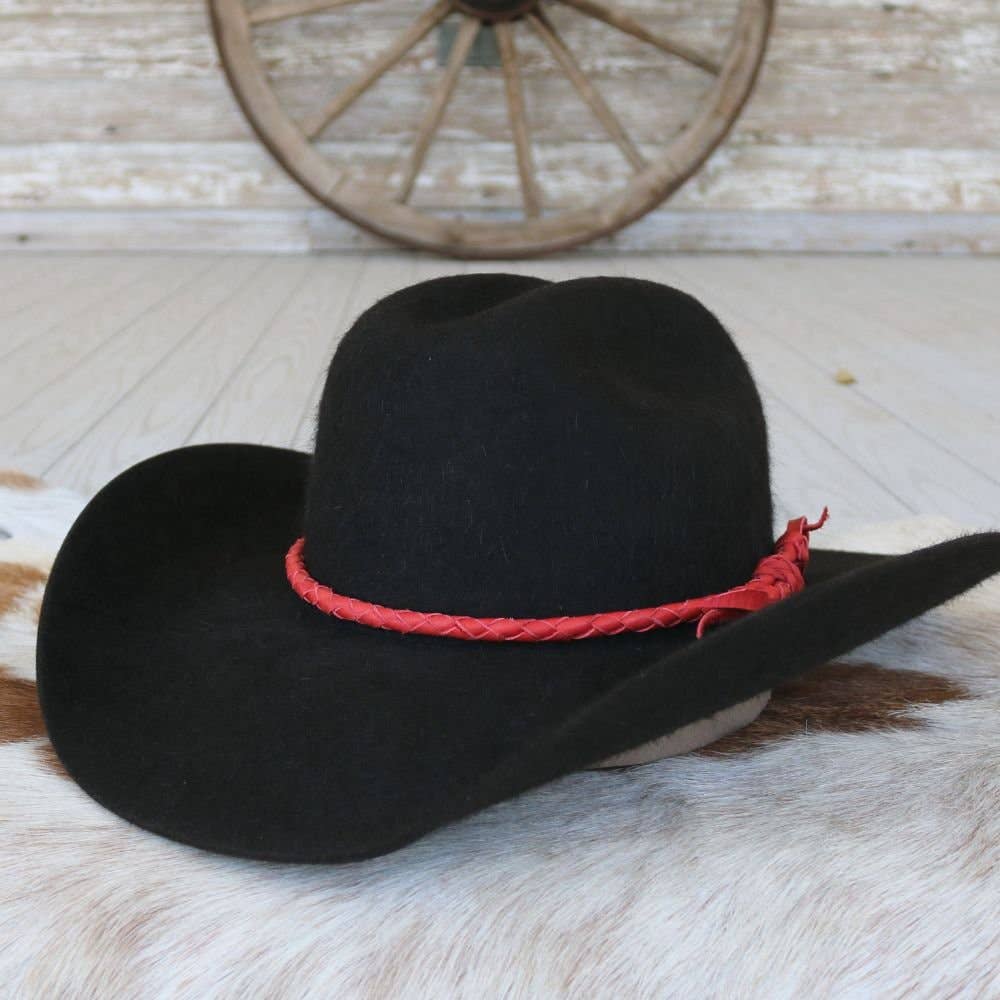 Black cowboy hat with red band.