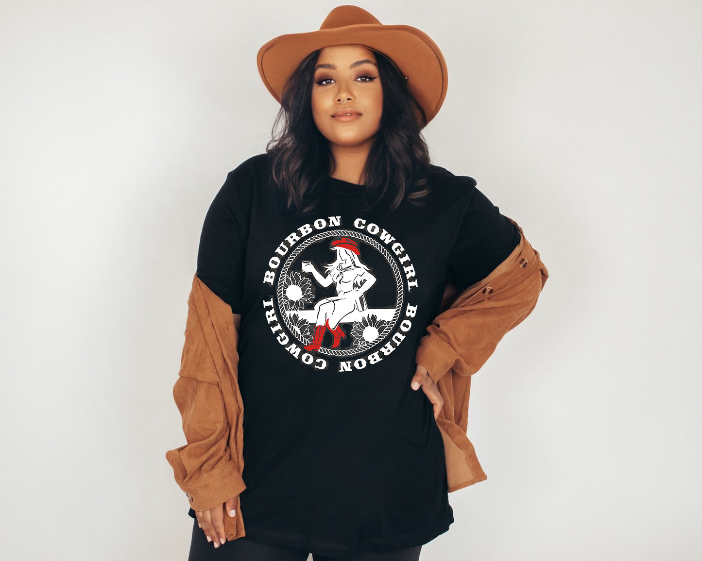 Woman in Bourbon Cowgirl tee and hat