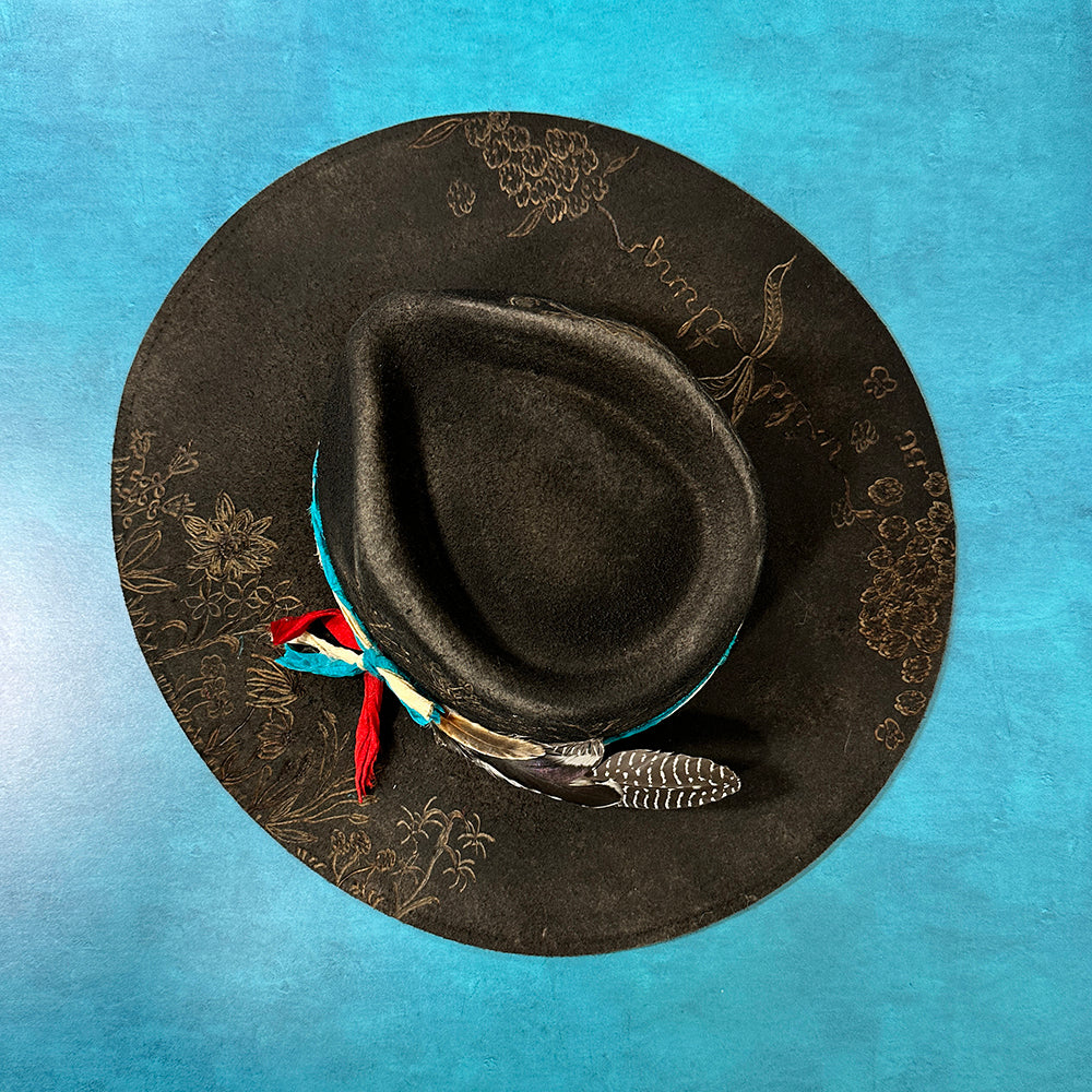 Black hat with floral design, BLTOPTQWEB