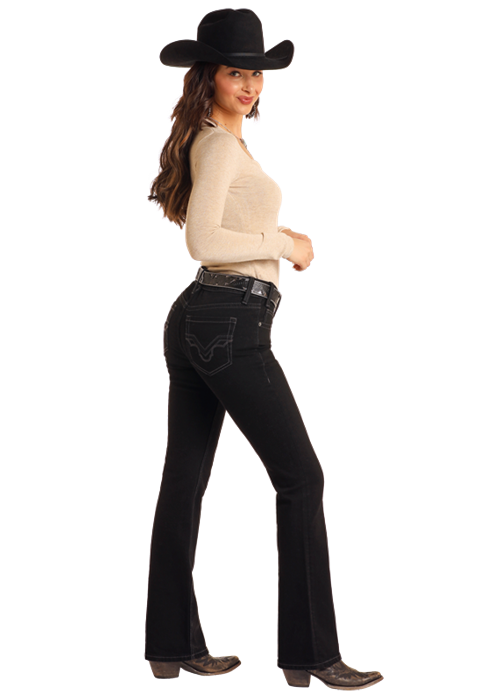 Woman in black jeans and cowboy hat
