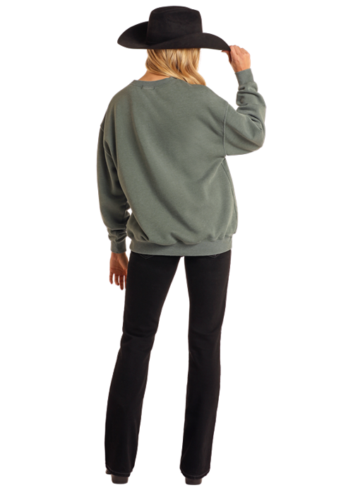 Woman in hat, sweatshirt, and black pants - BW91T05409