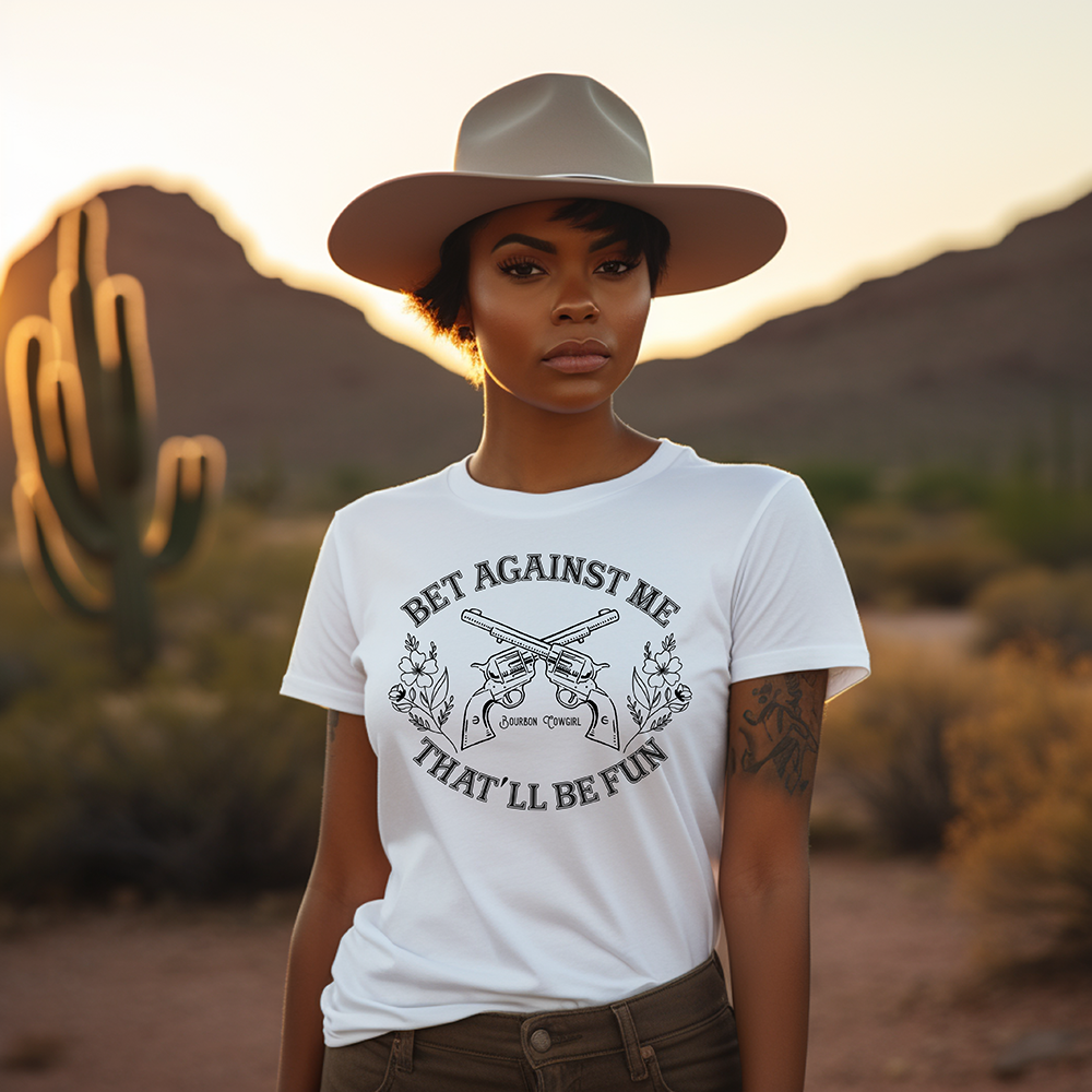 Woman in Bet Against Me tee, desert background