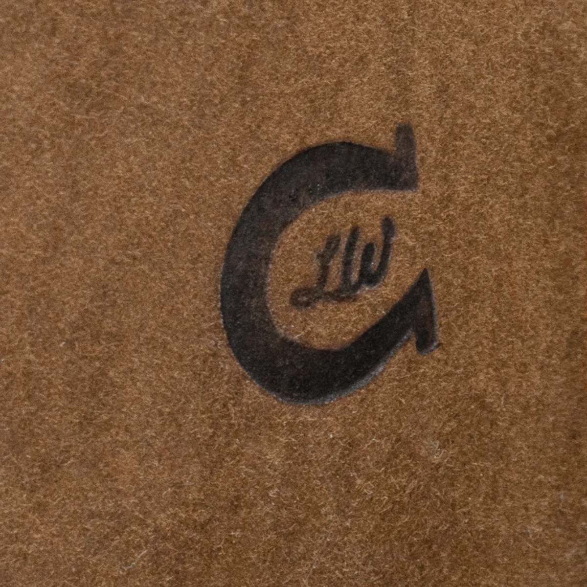 Brown background with black C and LW logo.