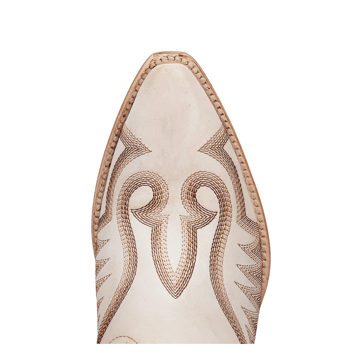 Close-up of cream-colored western boot toe with decorative stitching