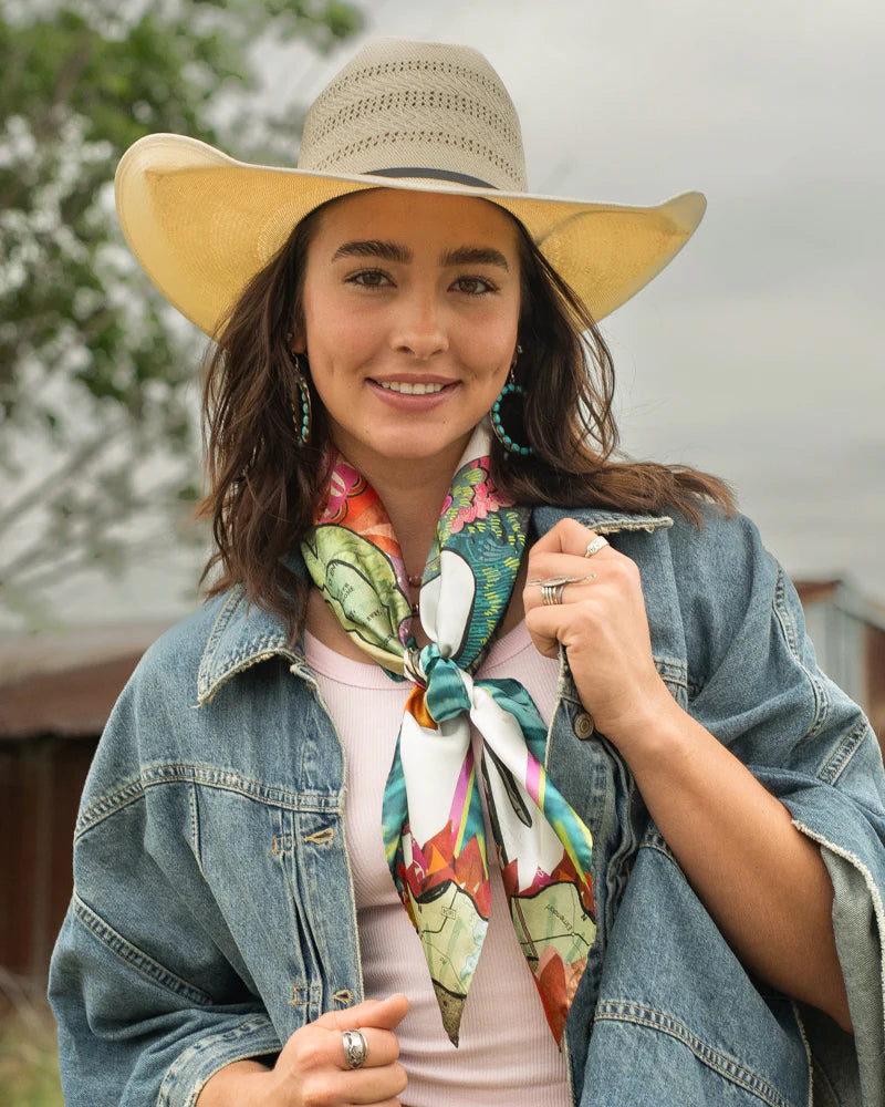 Woman in cowboy hat, scarf, and denim jacket - DSC_5981