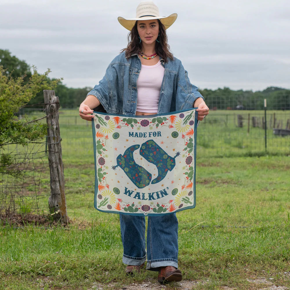 Woman in denim holding Made for Walkin' flag, DSC_5988