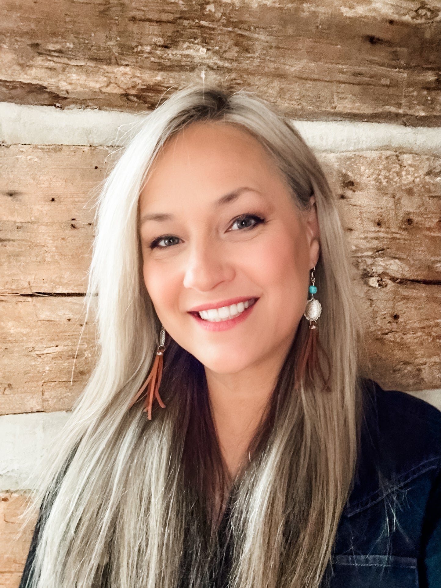 Woman with long blonde hair, smiling. Facetune image from 02-01-2024.