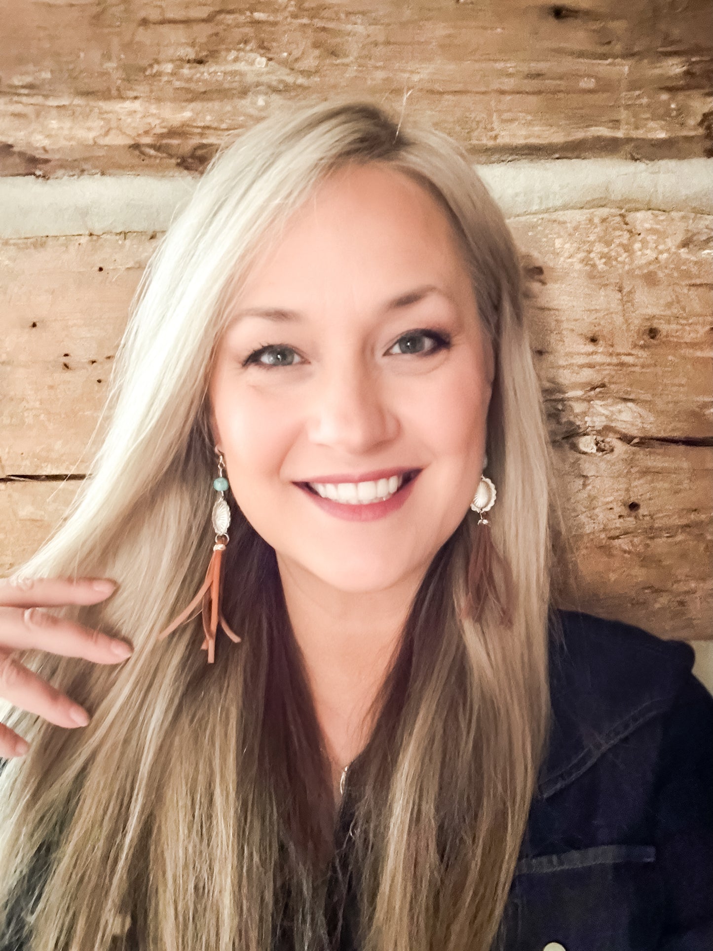 Smiling woman with blonde hair, Facetune photo from 02-01-2024