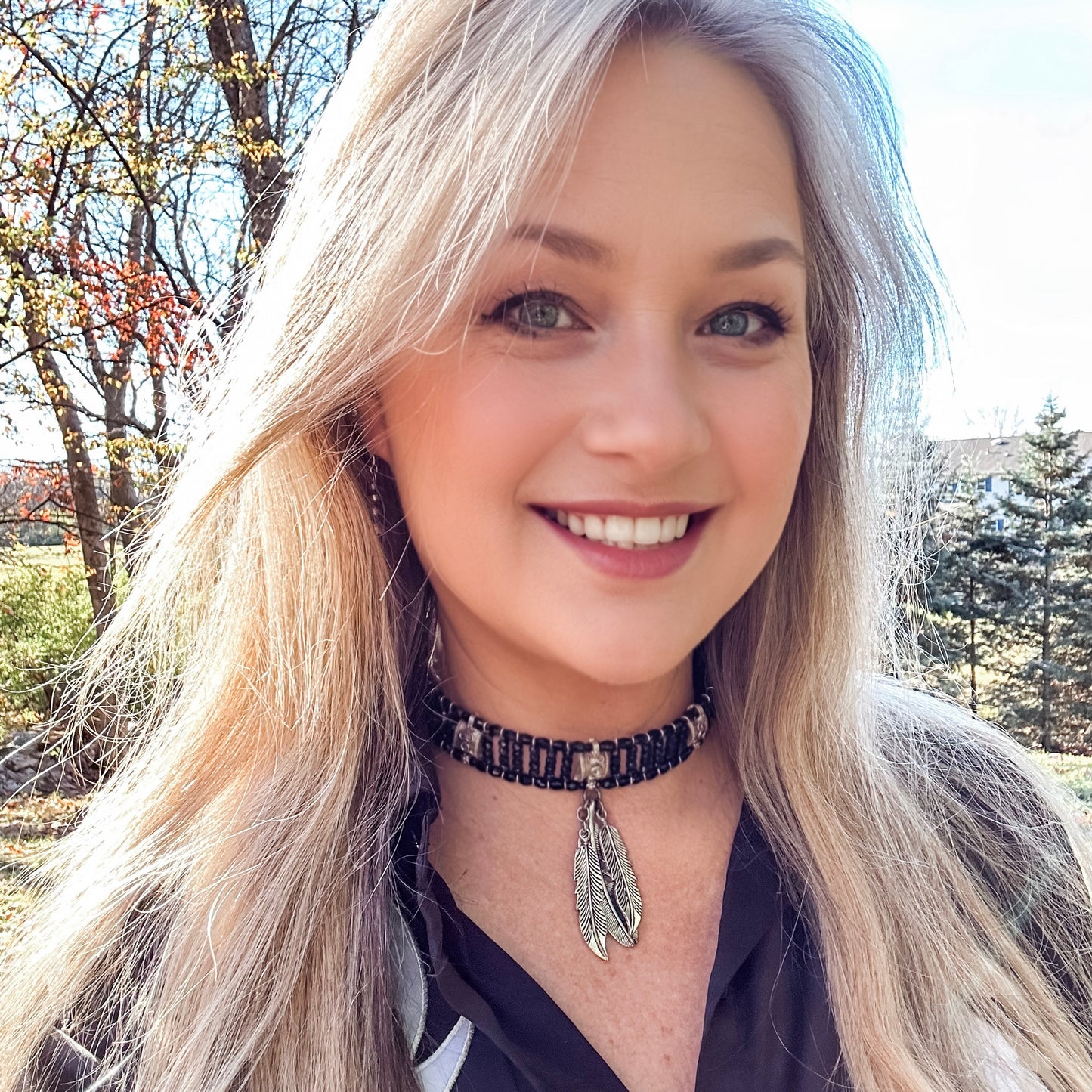 Smiling woman with necklace, Facetune edit, 11/13/2024