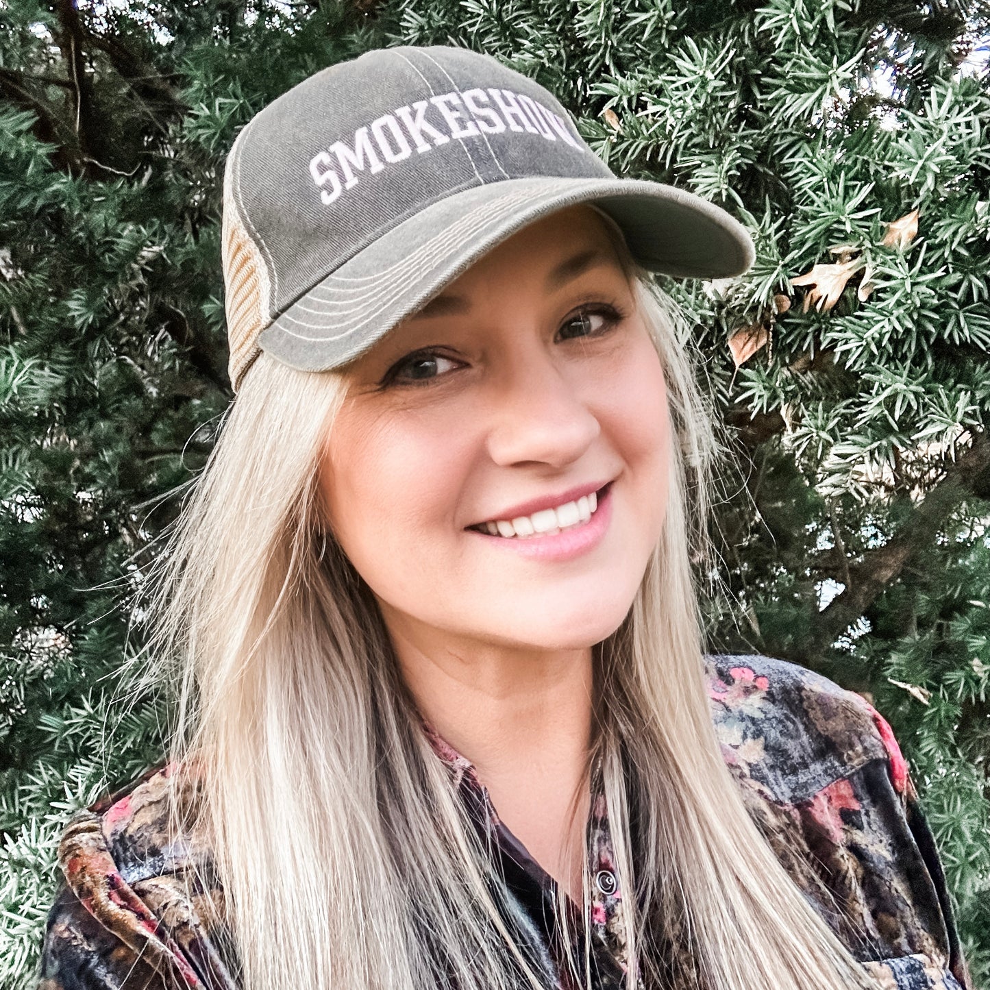 Woman in Smokeshow hat, Facetune image.