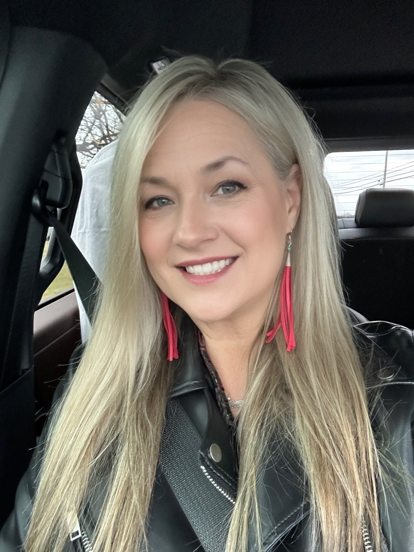 Woman with blonde hair, Facetune photo from Dec 31, 2023
