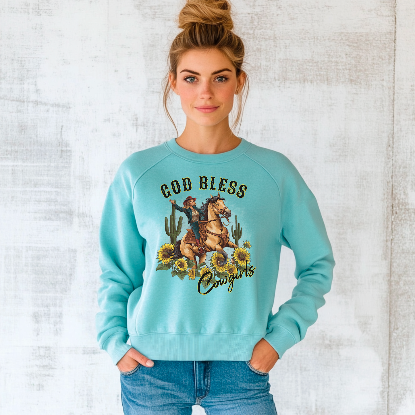God Bless Cowgirls sweatshirt with woman wearing it.