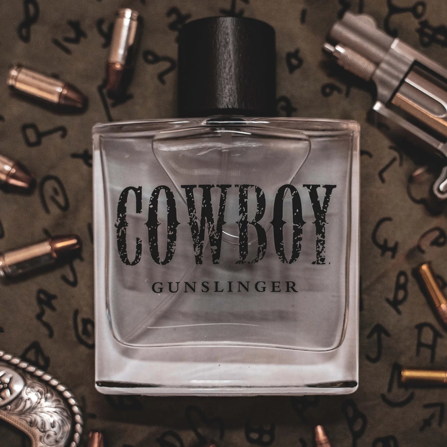 Gunslinger Cowboy cologne bottle with bullets and gun