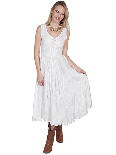 Woman in white dress and boots