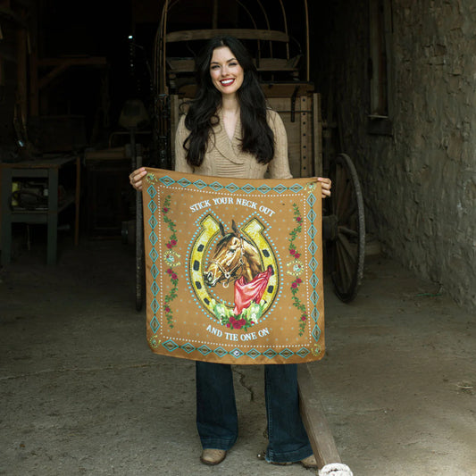 Woman holding vintage western fringe scarf