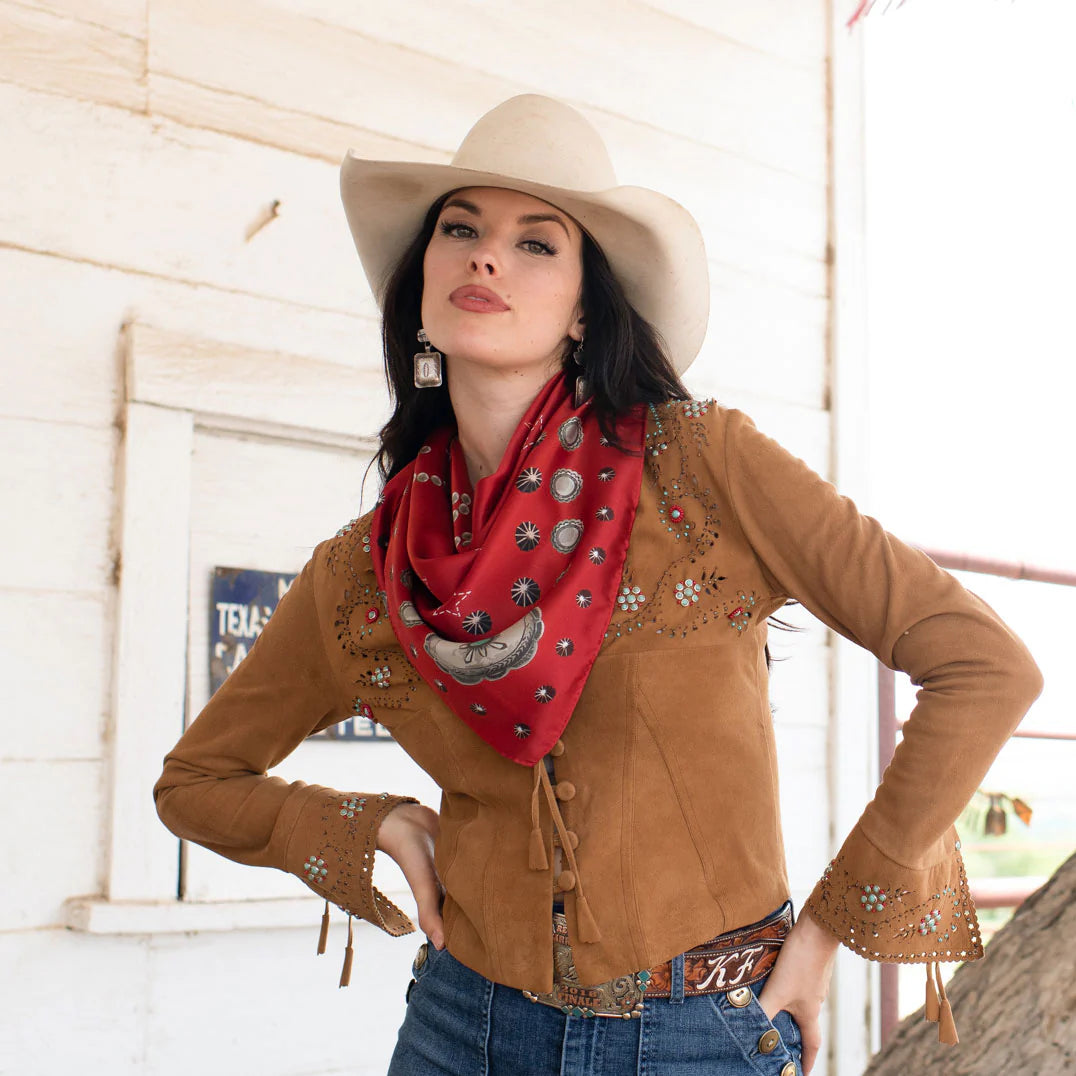 Woman in cowboy hat and red silk wild rag scarf