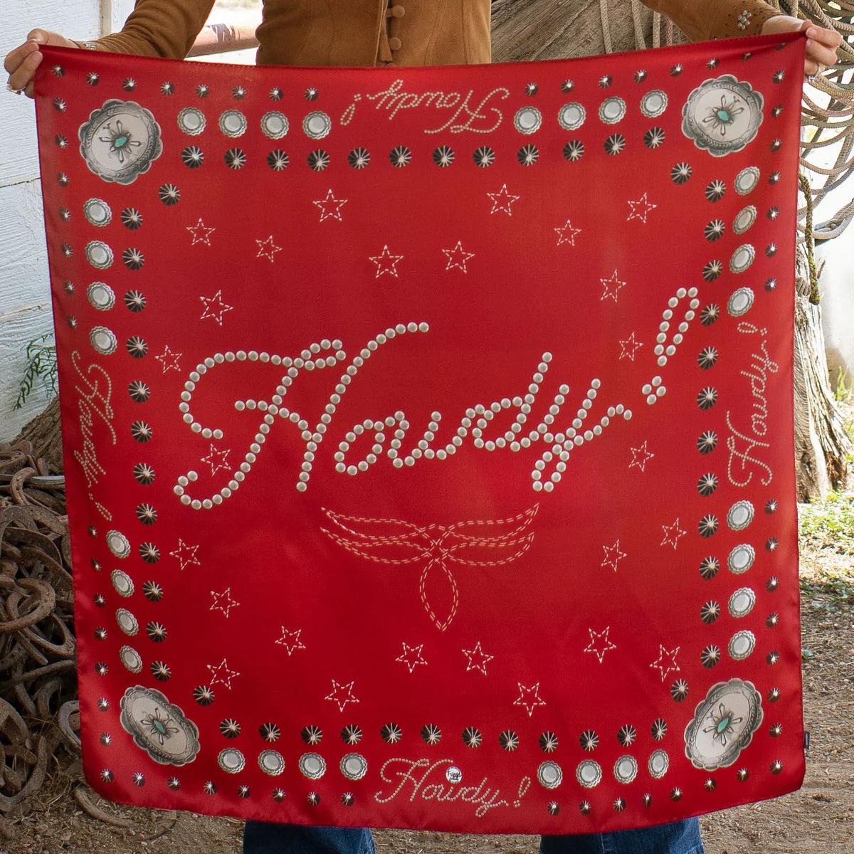 Red silk Howdy wild rag scarf with concho accents.