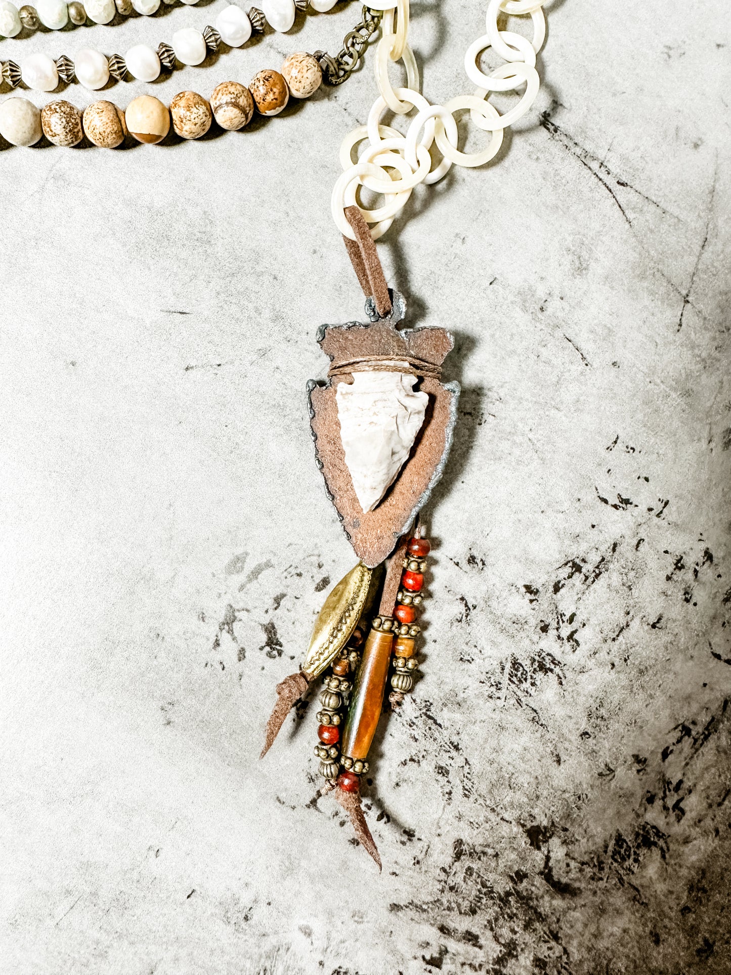 Necklace with arrowhead pendant