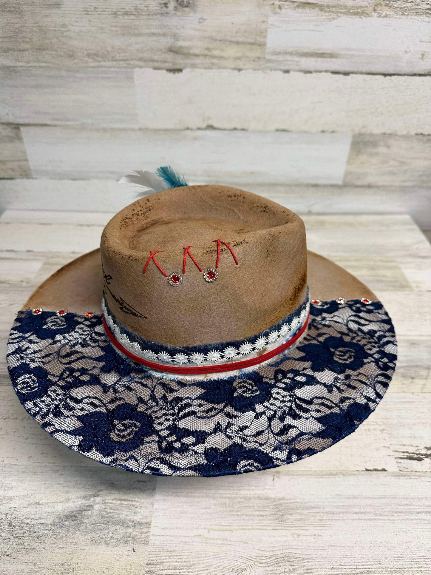 Cowboy hat with lace brim.