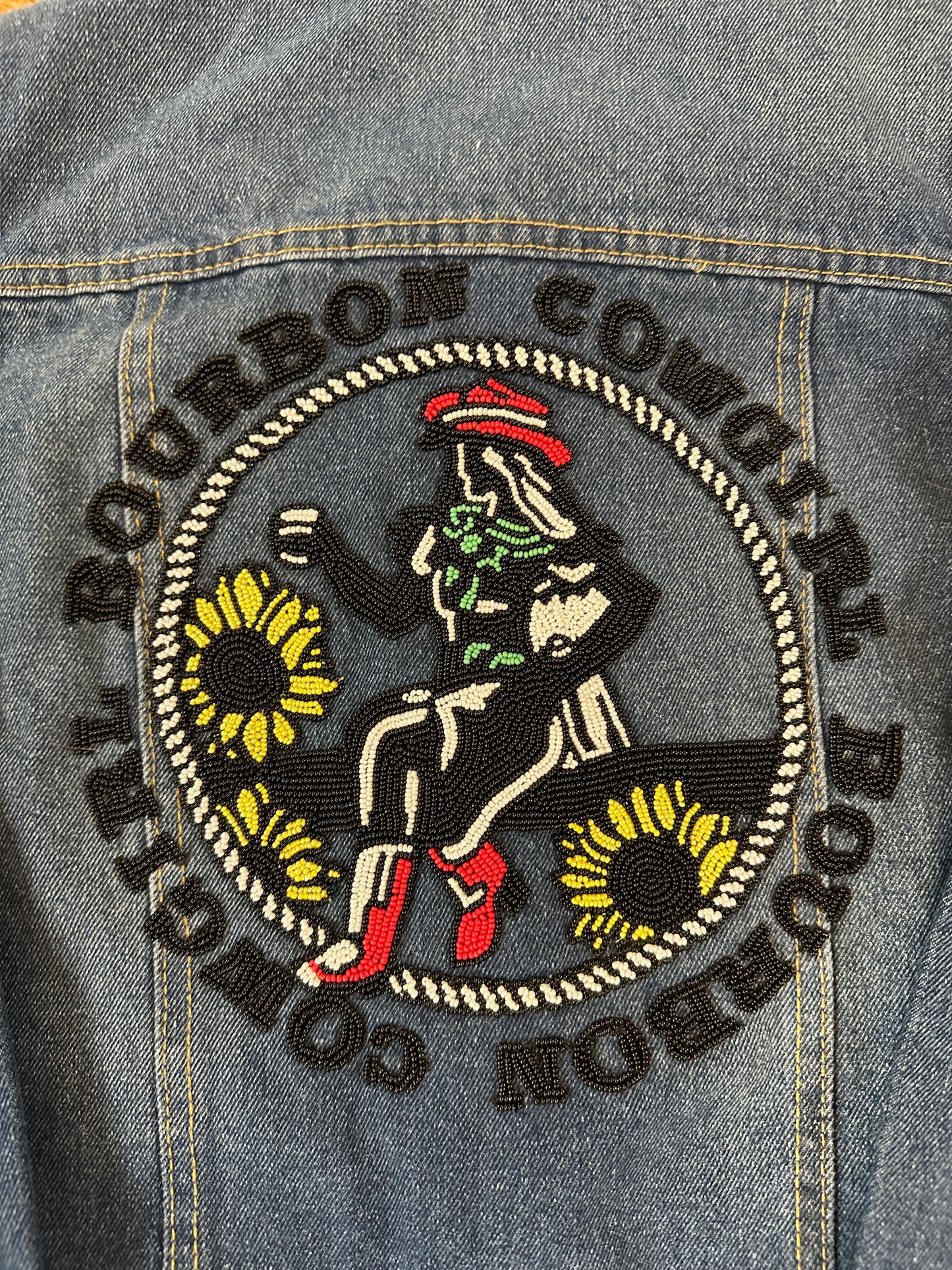 Denim jacket with Bourbon Cowgirl patch.