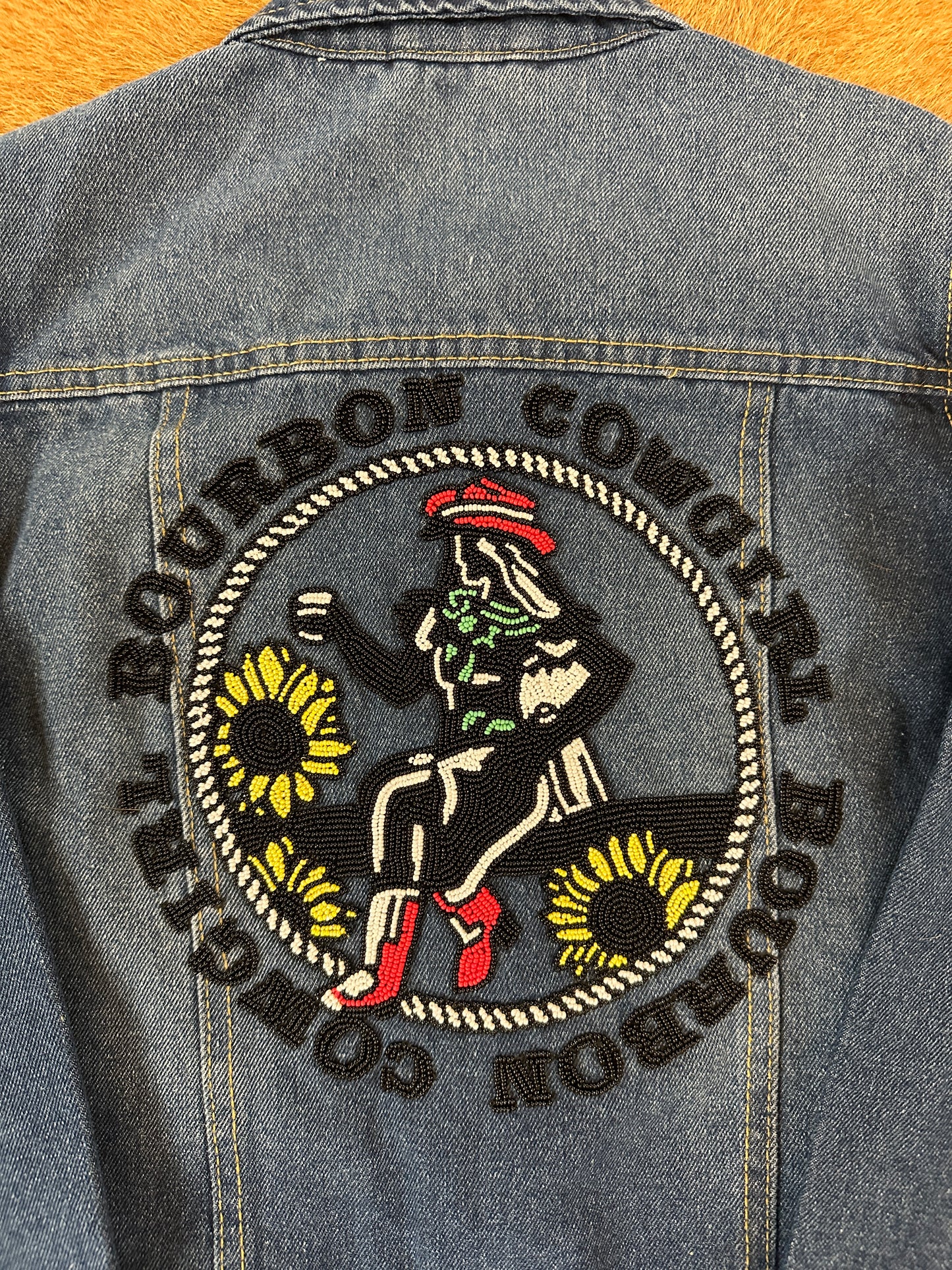 Denim jacket with Bourbon Cowgirl patch.