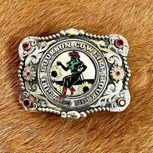 Silver belt buckle with Bourbon Cowgirl design.