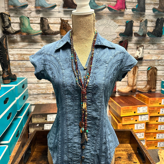 Blue embroidered shirt and necklace on mannequin, IMG_71952