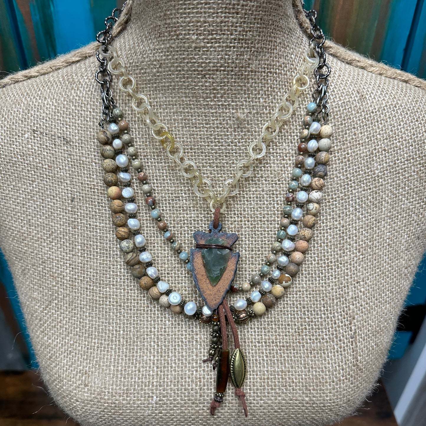 Necklace on a mannequin.