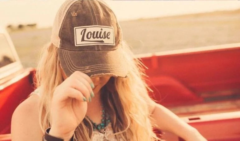 Louise wearing hat, 2000x2000 image